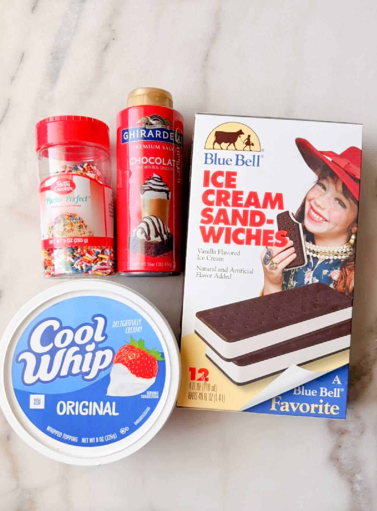 ice cream sandwiches, cool whip, chocolate syrup, jimmies.