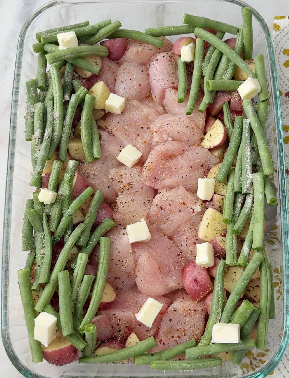 adding pats of butter.