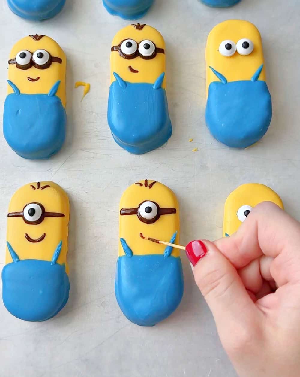 decorating with candy eyes and mouth.