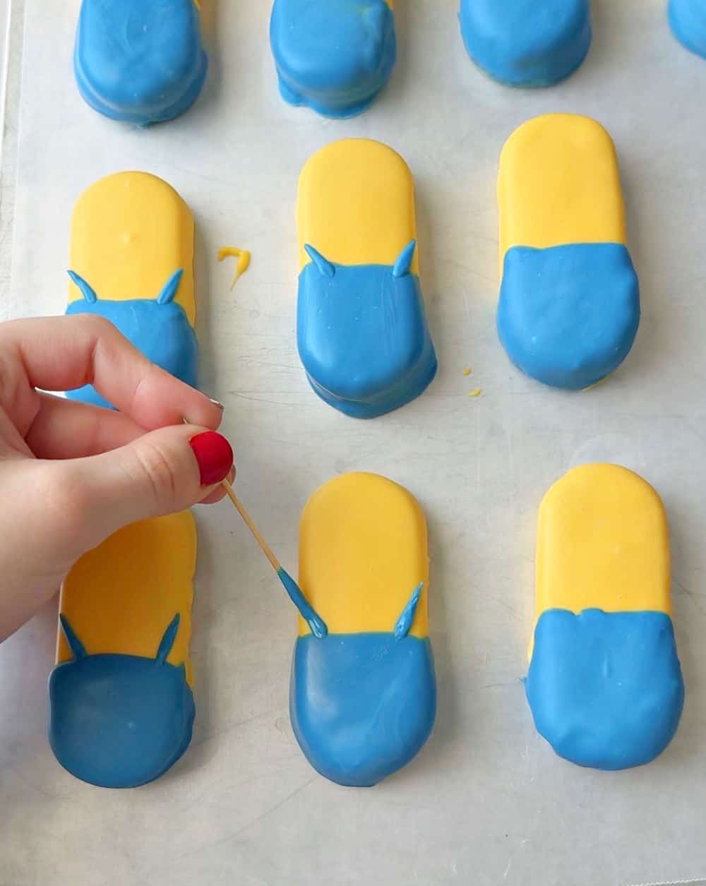 adding clothes with toothpick.