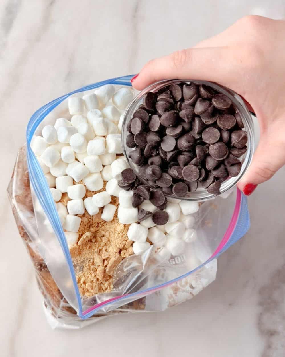 adding ingredients to freezer bag.