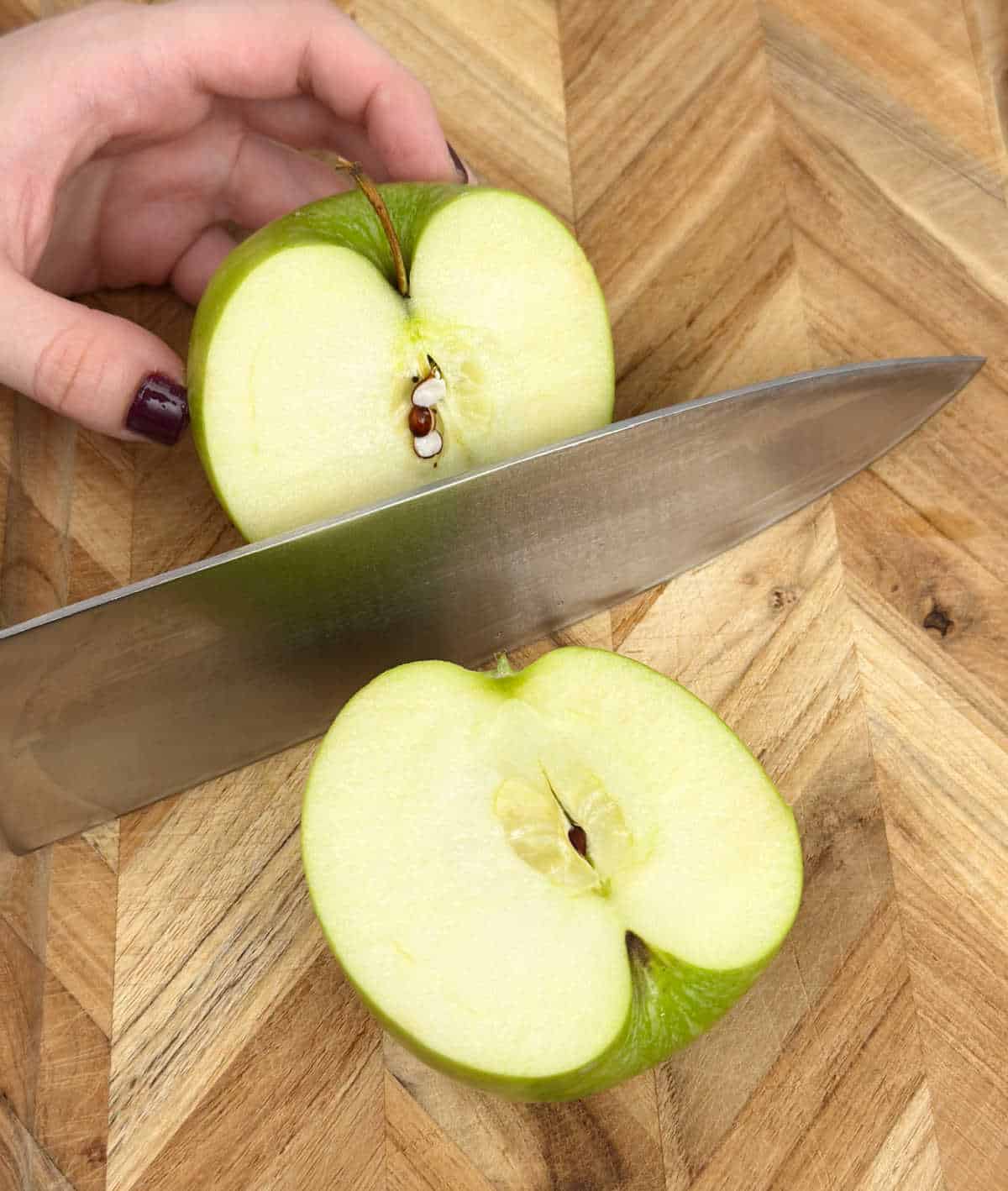 slicing apples in half.