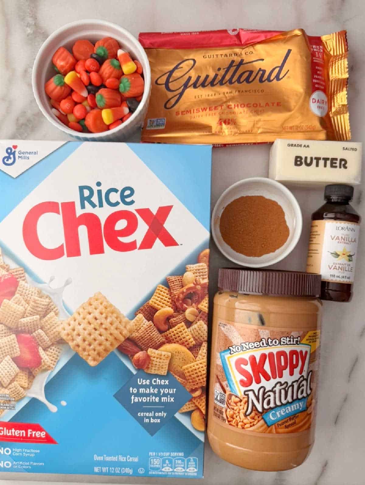 rice chex, candy, chocolate chips, spices, peanut butter, butter, vanilla.