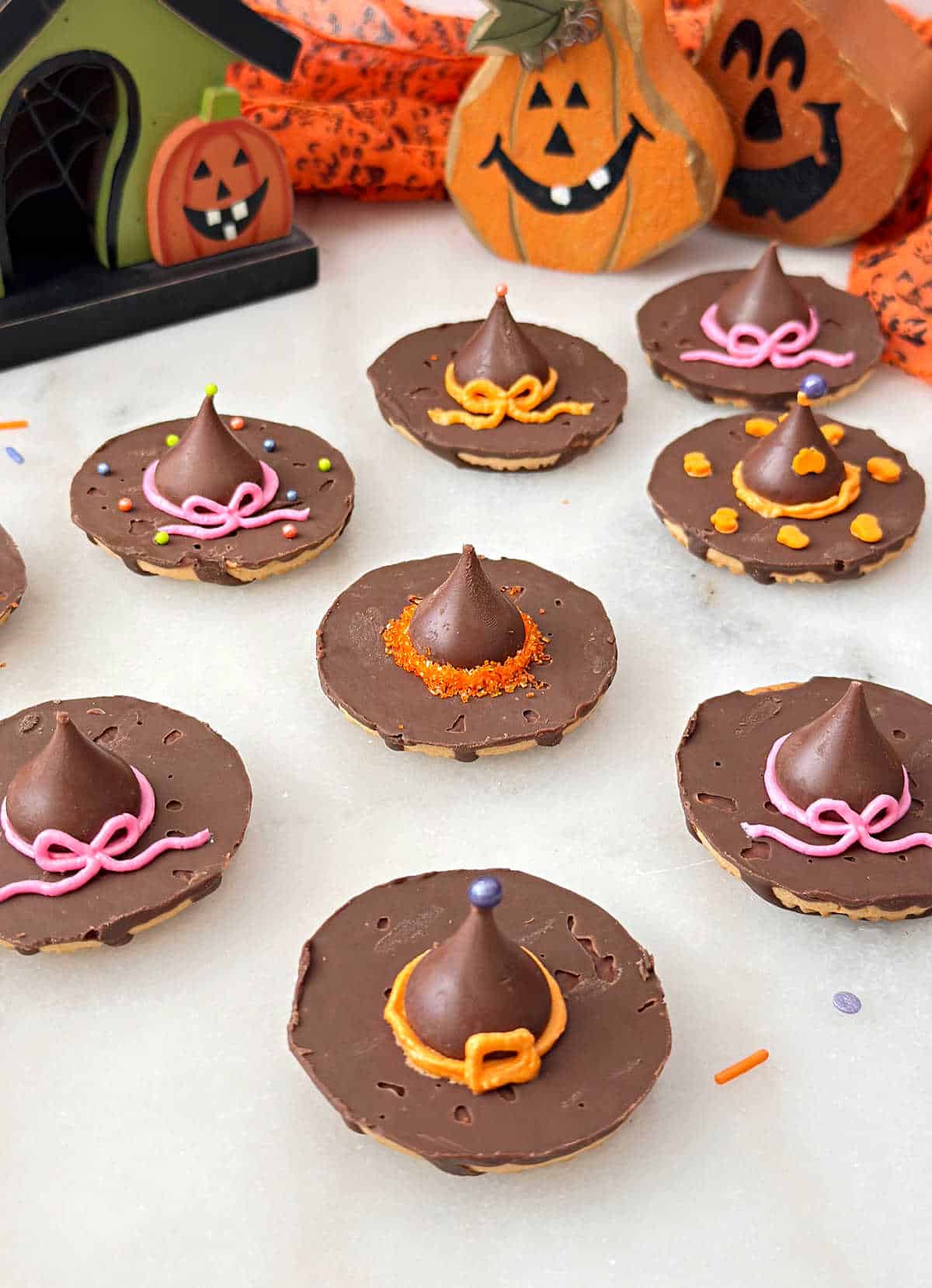 chocolate witches hat cookies with fudge stripes and kisses for Halloween.