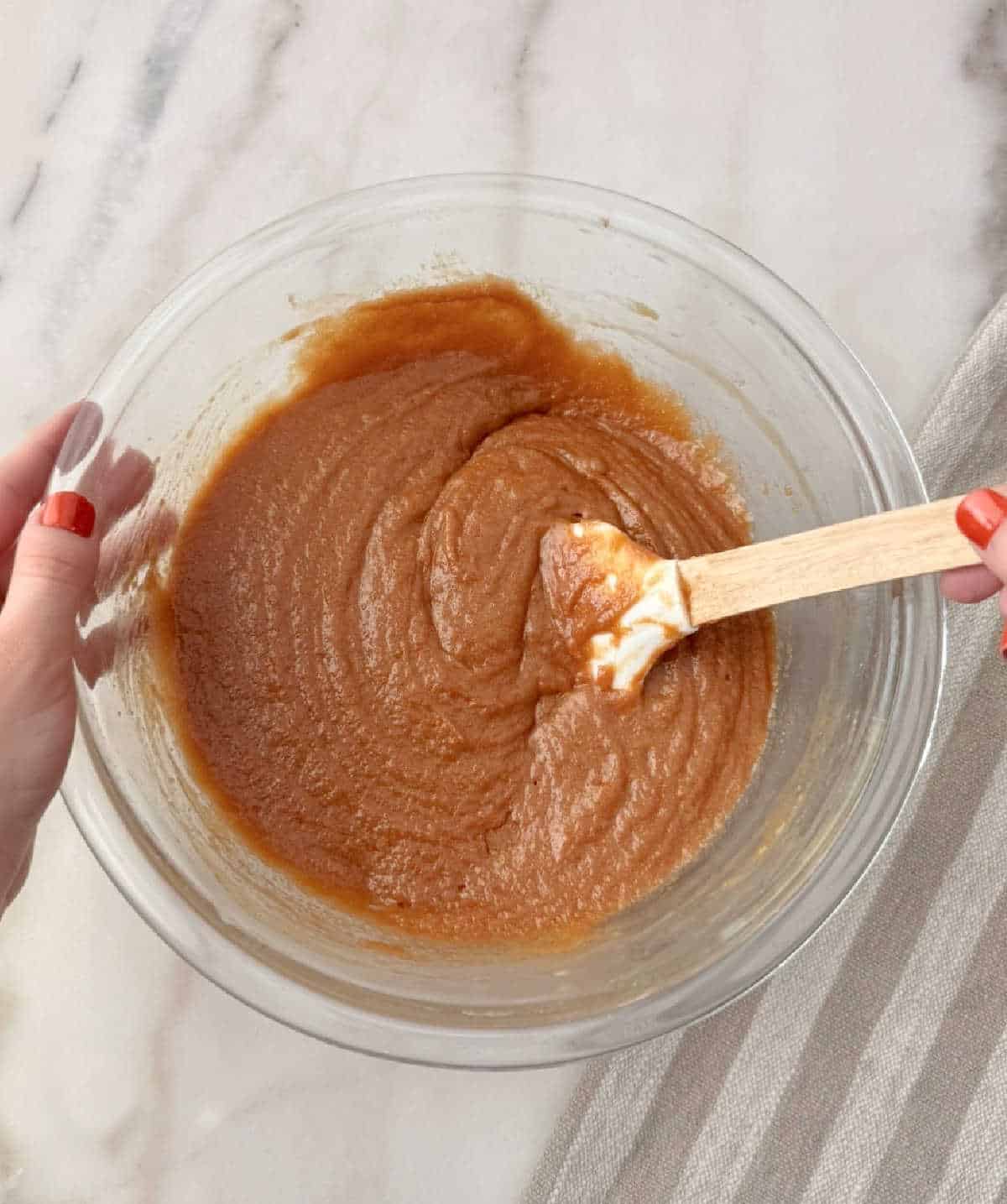 stirring wet ingredients.