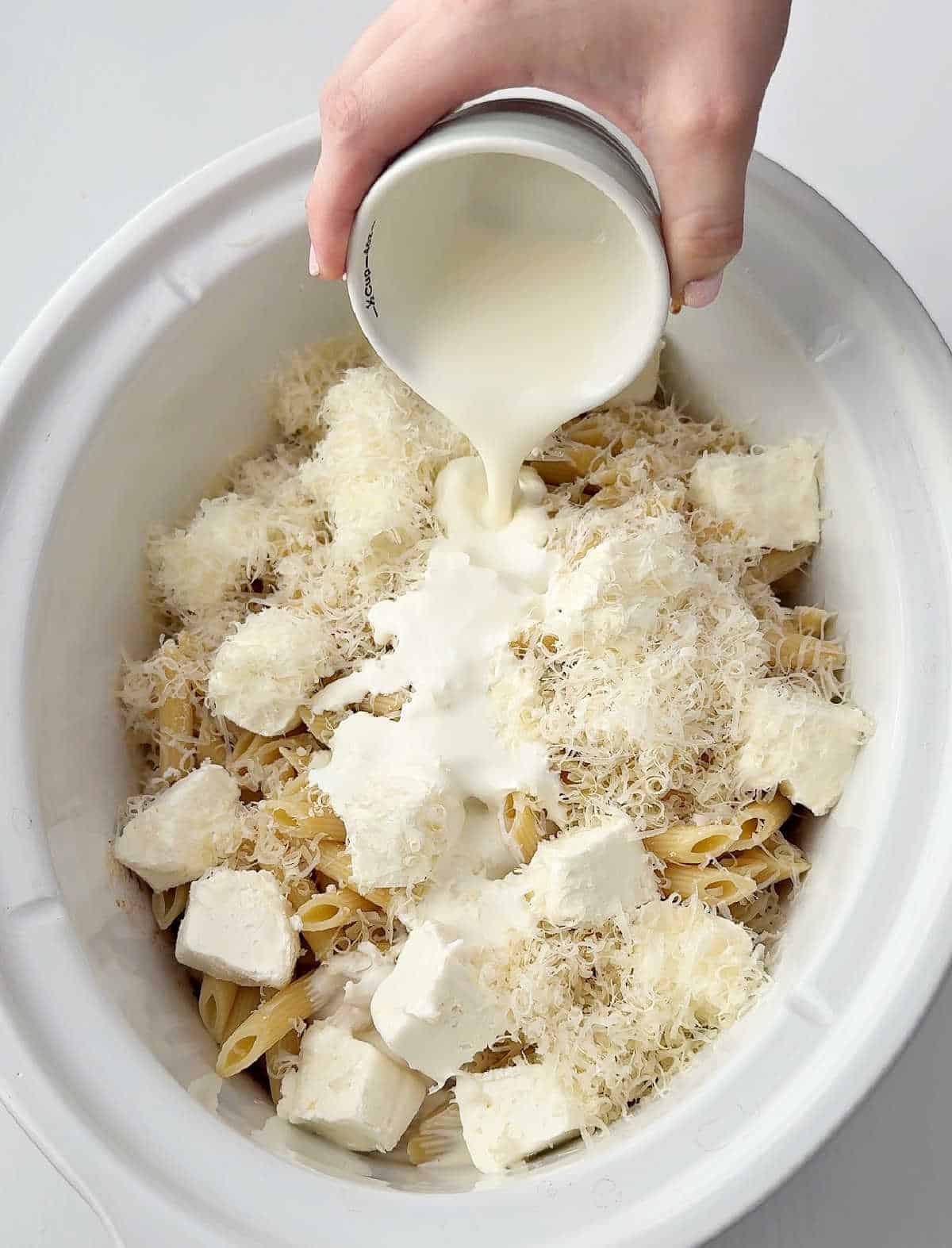adding all ingredients to crockpot.
