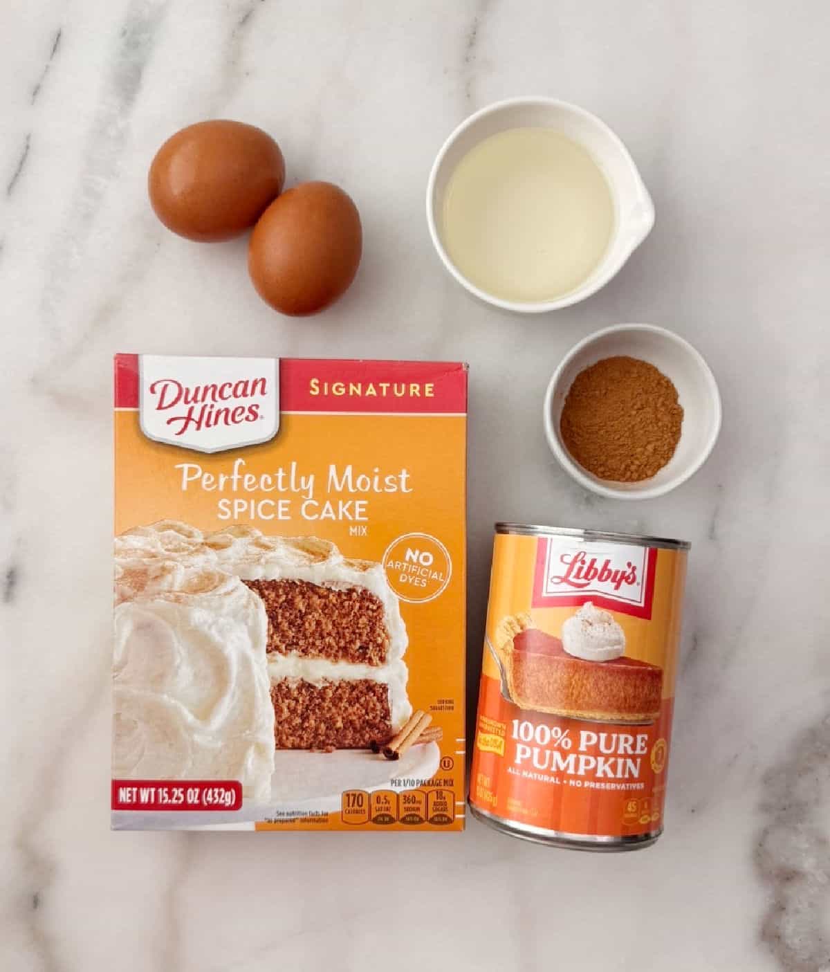 spice cake mix, eggs, oil, canned pumpkin and optional cinnamon.