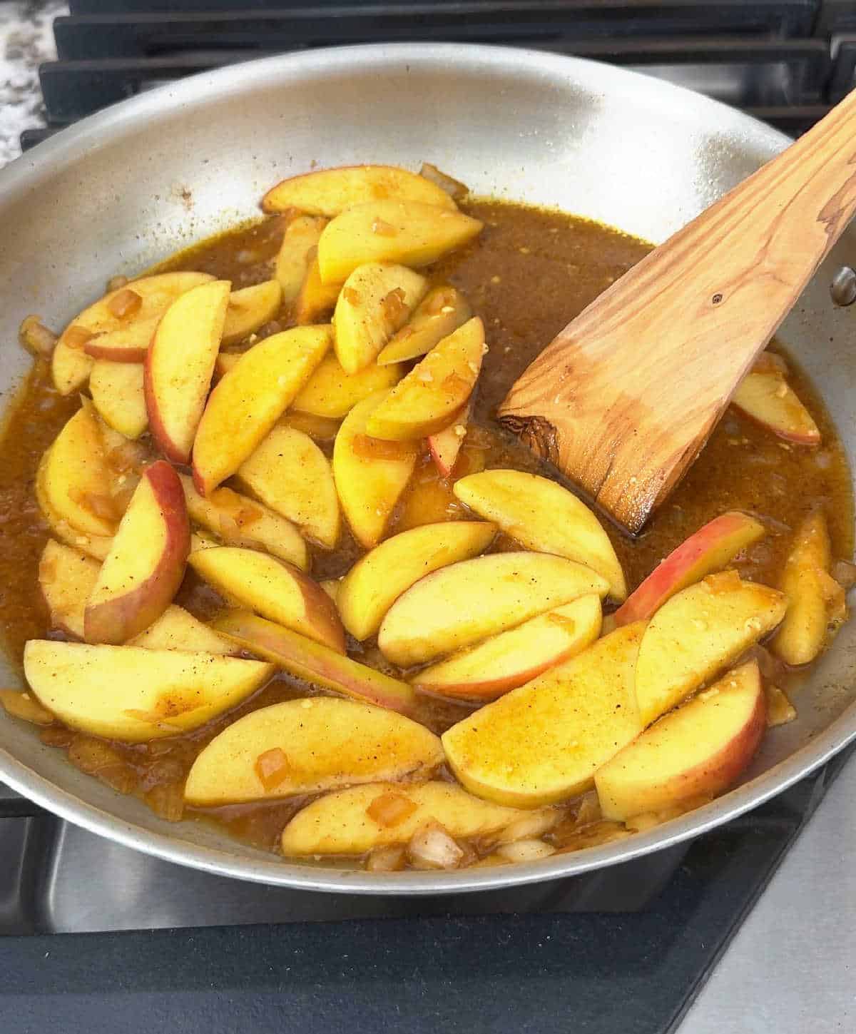 deglazing pan and adding apples and onions.