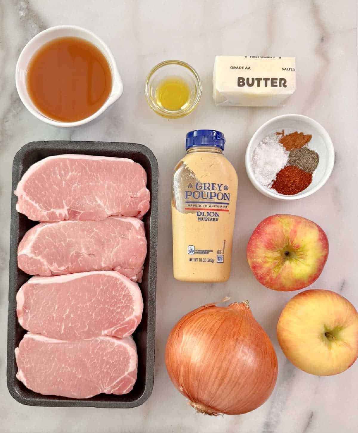 boneless pork chops, apples, cider, butter, olive oil, mustard, onion, spices.