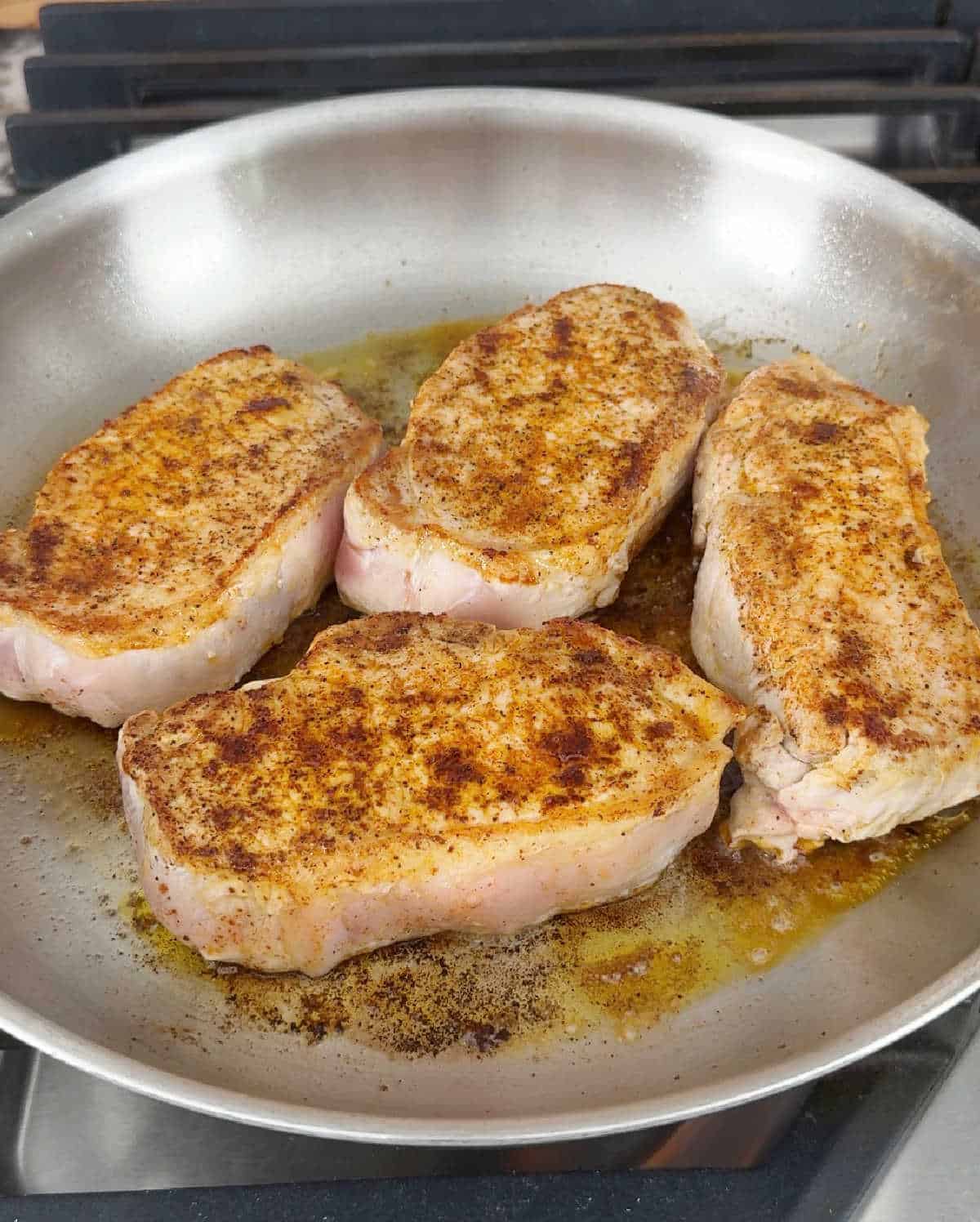 searing chops in skillet.