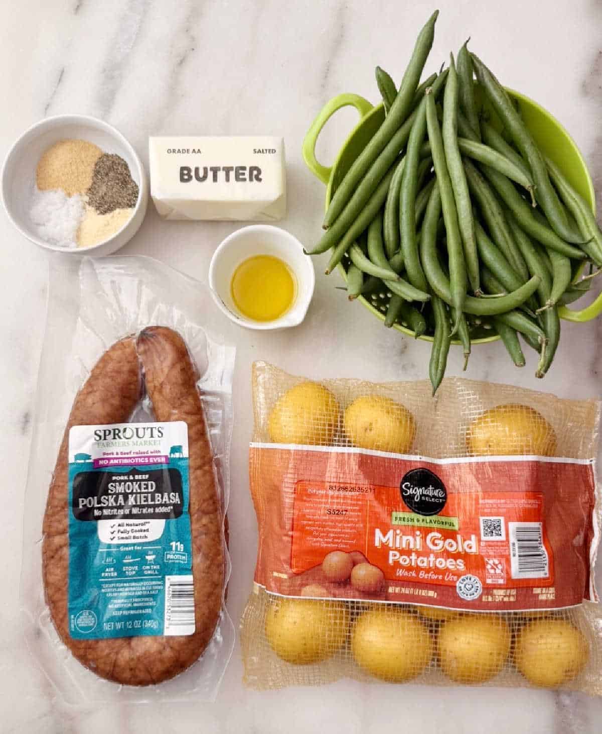 smoked kielbasa, mini potatoes, green beans, butter, olive oil, seasonings.