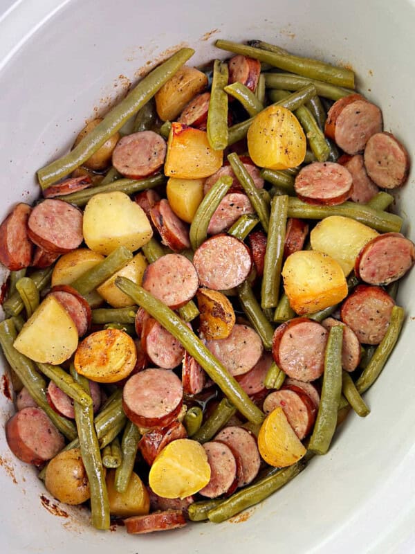 crockpot smoked sausage and potatoes with green beans in slow cooker