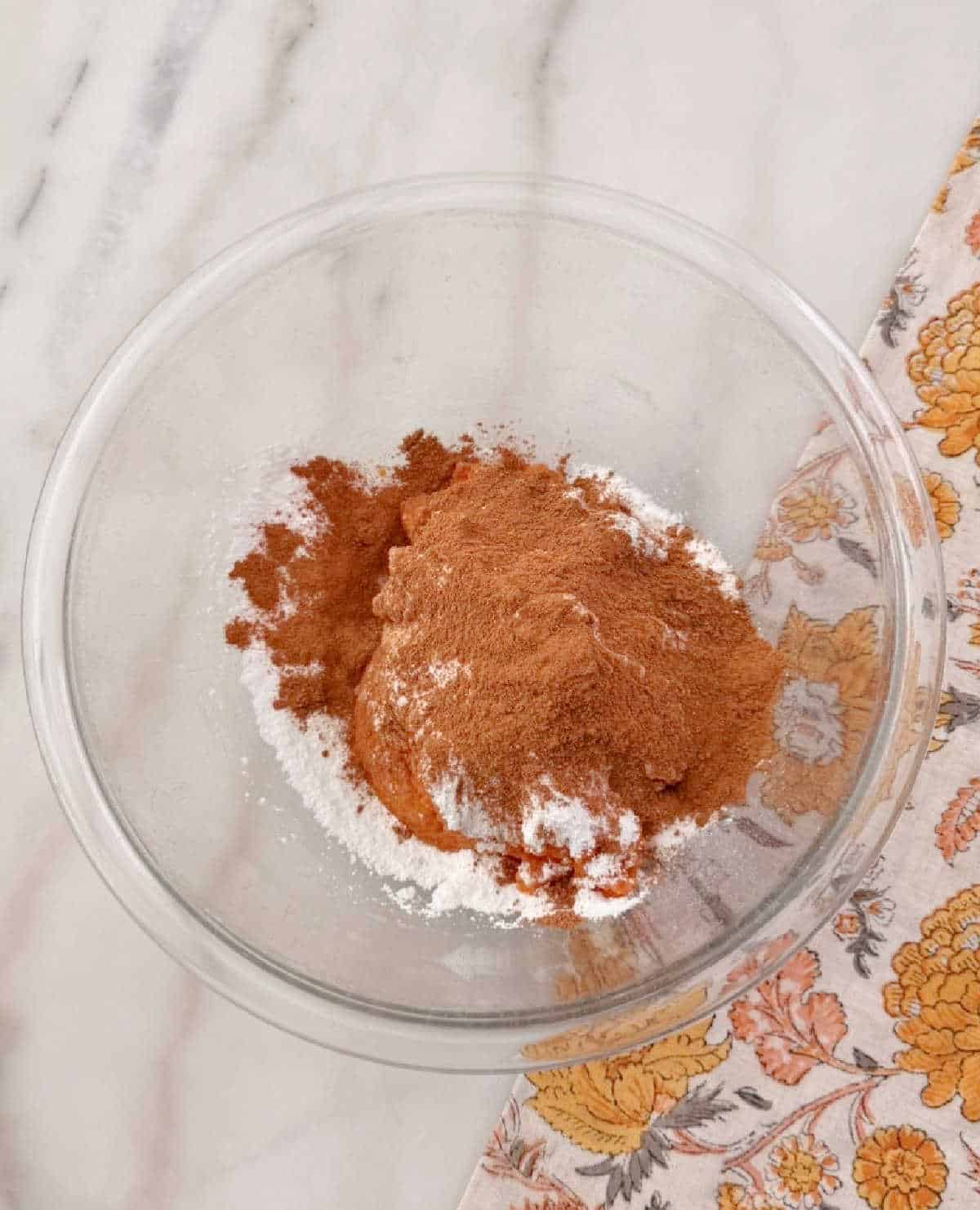 adding ingredients to mixing bowl.