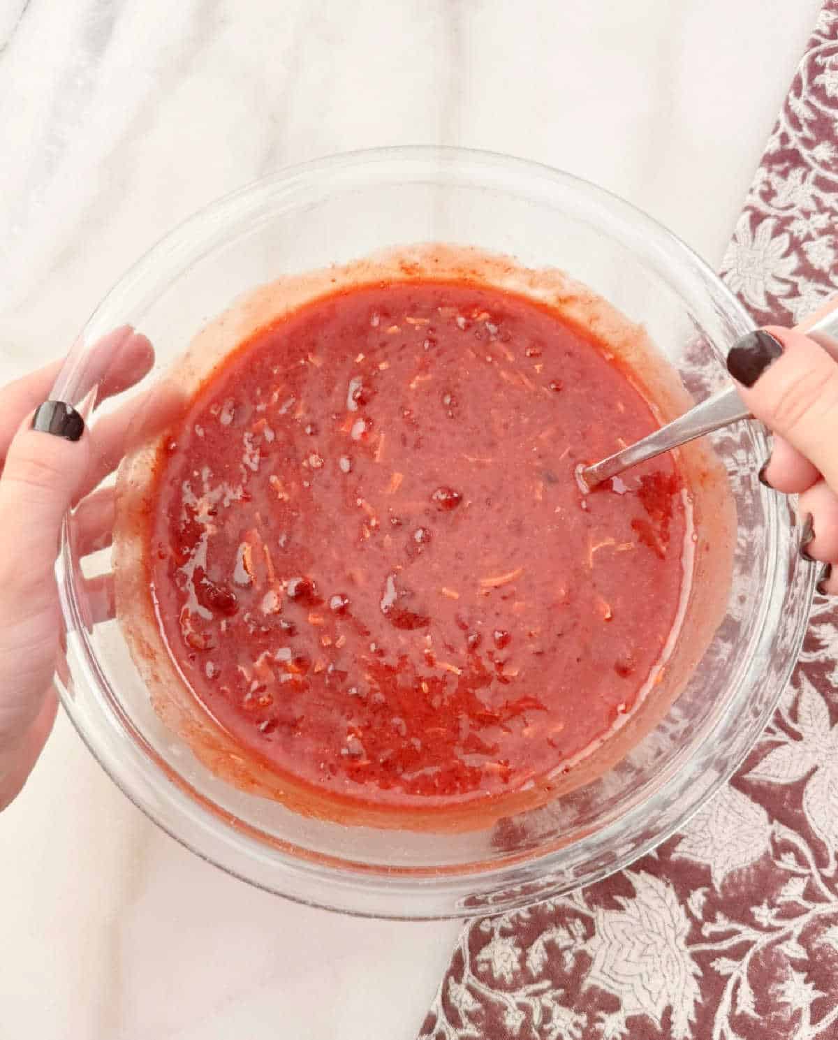 mixing sauce ingredients in mixing bowl.